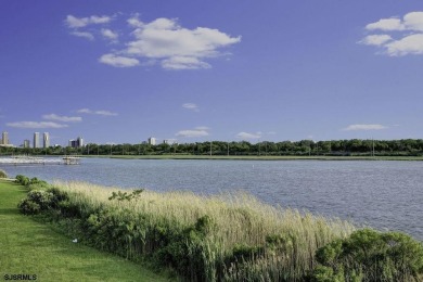 NOW IS YOUR CHANCE TO OWN A CUSTOM BUILT BAY FRONT HOME. THIS