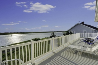 NOW IS YOUR CHANCE TO OWN A CUSTOM BUILT BAY FRONT HOME. THIS