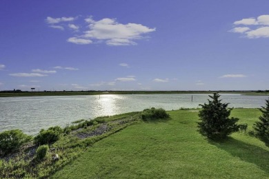 NOW IS YOUR CHANCE TO OWN A CUSTOM BUILT BAY FRONT HOME. THIS