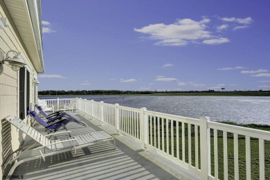 NOW IS YOUR CHANCE TO OWN A CUSTOM BUILT BAY FRONT HOME. THIS