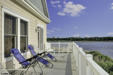 NOW IS YOUR CHANCE TO OWN A CUSTOM BUILT BAY FRONT HOME. THIS