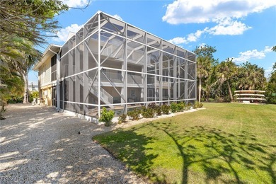 Stunning Waterfront Elevated 3-Story Home with Breathtaking