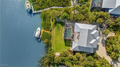Stunning Waterfront Elevated 3-Story Home with Breathtaking
