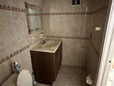 A Gorgeous 3 bedrooms and 2 baths with a den that is currently