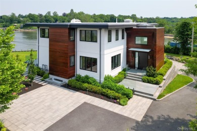 70 Candy Lane is a one-of-a-kind waterfront mansion located in