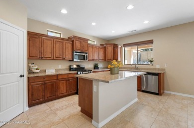 This well-maintained home is in a desirable neighborhood next to