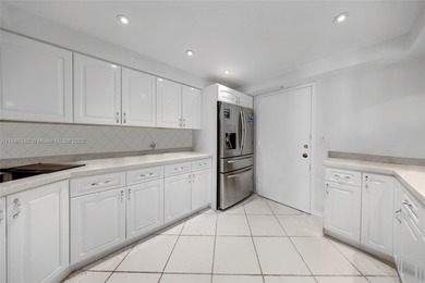 Enjoy breathtaking Bay views from this elegant 2 bed / 2 bath