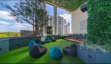 ELEGANT CONDO IN THE PRESTIGIOUS ENVY RESIDENCES. SPACIOUS OPEN