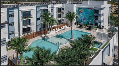 ELEGANT CONDO IN THE PRESTIGIOUS ENVY RESIDENCES. SPACIOUS OPEN