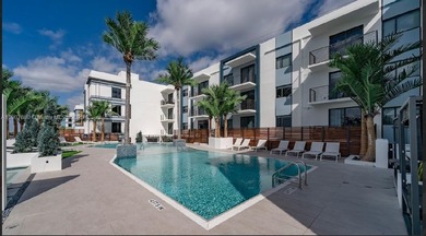 ELEGANT CONDO IN THE PRESTIGIOUS ENVY RESIDENCES. SPACIOUS OPEN