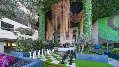 ELEGANT CONDO IN THE PRESTIGIOUS ENVY RESIDENCES. SPACIOUS OPEN