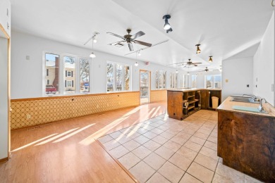 This commercial real estate property comprises a three-unit