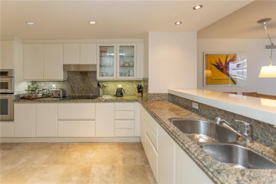 Enjoy ocean views from this beautiful spacious 1,740 SF condo