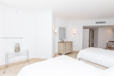 Enjoy ocean views from this beautiful spacious 1,740 SF condo