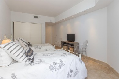 Enjoy ocean views from this beautiful spacious 1,740 SF condo