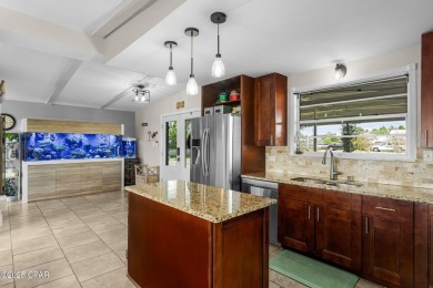 Waterfront living is within reach. This lovely home sits on a