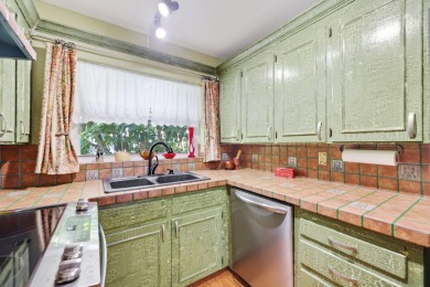 Welcome to 700 NE Harbour Terr -- a bright and inviting condo