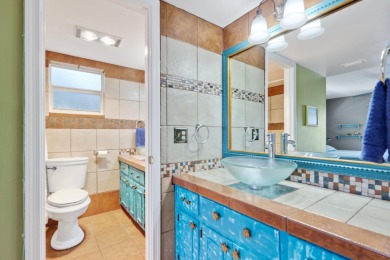 Welcome to 700 NE Harbour Terr -- a bright and inviting condo