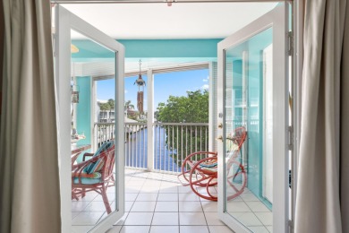 Welcome to 700 NE Harbour Terr -- a bright and inviting condo