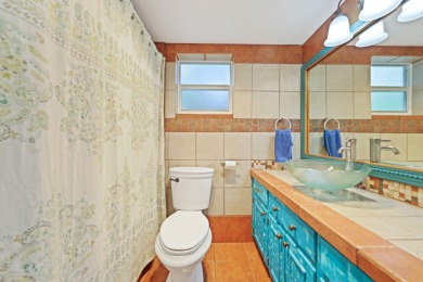 Welcome to 700 NE Harbour Terr -- a bright and inviting condo