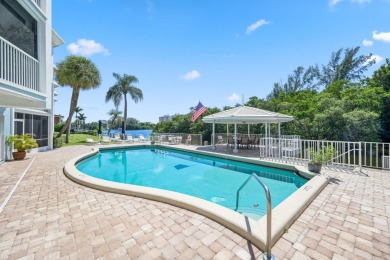 Welcome to 700 NE Harbour Terr -- a bright and inviting condo