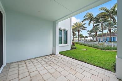 An elevated expression of coastal living, this three-story Water