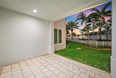 An elevated expression of coastal living, this three-story Water