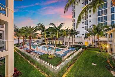 An elevated expression of coastal living, this three-story Water