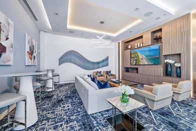 An elevated expression of coastal living, this three-story Water