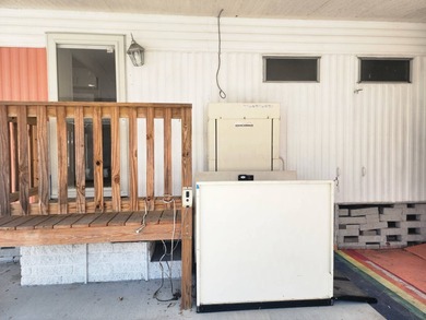 Welcome to this corner lot manufactured double-wide in a