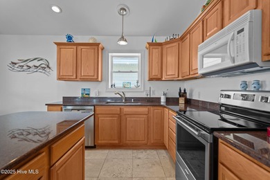 Enjoy coastal living with this rare opportunity to own two