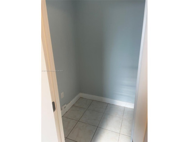 This spacious 2 bedroom condo, is securely located in a gated