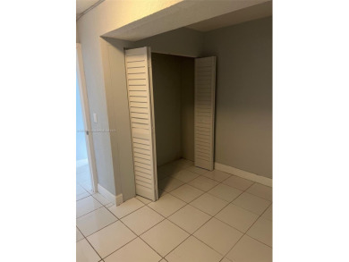 This spacious 2 bedroom condo, is securely located in a gated