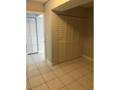 This spacious 2 bedroom condo, is securely located in a gated