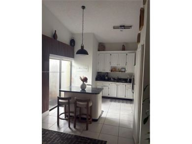 Stunning one-story villa with breathtaking lakefront views! This