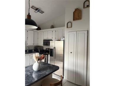 Stunning one-story villa with breathtaking lakefront views! This