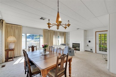 This is a Lovely Home that cuddles the Top of the Hill on the