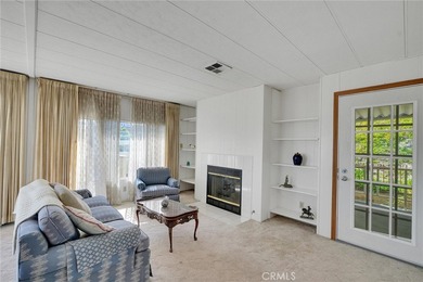 This is a Lovely Home that cuddles the Top of the Hill on the