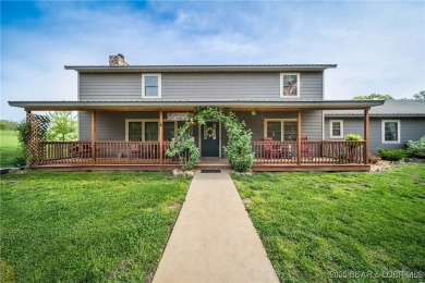 Luxury Meets Rustic Charm on 185 Acres! This turnkey estate