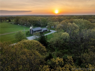 Luxury Meets Rustic Charm on 185 Acres! This turnkey estate