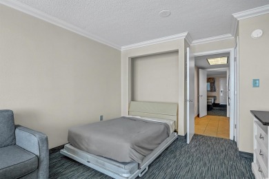 This Coral Beach furnished 1 BR/1 BA DIRECT OCEANFRONT PENTHOUSE