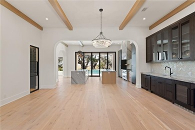 TIMELESS LUXURY & COASTAL SPLENDOR! On 1.33 acres overlooking