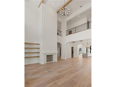 TIMELESS LUXURY & COASTAL SPLENDOR! On 1.33 acres overlooking