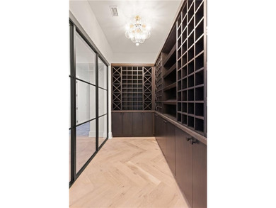 TIMELESS LUXURY & COASTAL SPLENDOR! On 1.33 acres overlooking