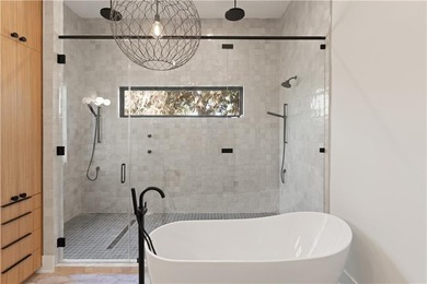 TIMELESS LUXURY & COASTAL SPLENDOR! On 1.33 acres overlooking