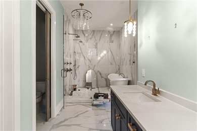 TIMELESS LUXURY & COASTAL SPLENDOR! On 1.33 acres overlooking