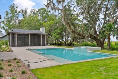 TIMELESS LUXURY & COASTAL SPLENDOR! On 1.33 acres overlooking