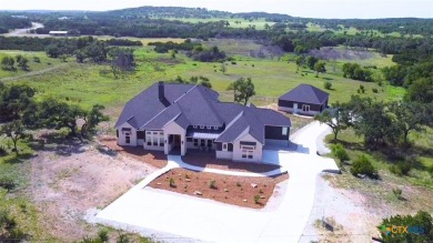 Situated on nearly 5 private acres in the prestigious Mystic