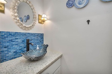 Architecturally stunning unit in the iconic Village Plaza! Built