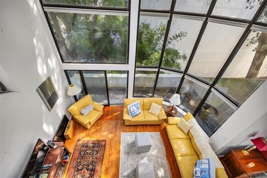 Architecturally stunning unit in the iconic Village Plaza! Built